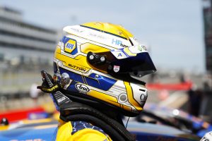 Side profile of Ash Sutton in his helmet at BTCC Brands Hatch