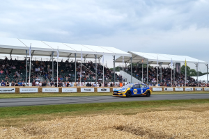 NAPA Racing UK Ford Focus on the track in front of a large crowd at Goodwood Festival of Speed