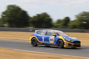 Sutton speeds along the track at the Goodyear Tyre Test