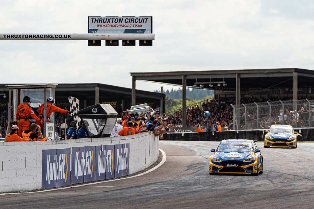 NAPA Racing UK's Sutton and Cammish navigate a bend together at BTCC Thruxton, where they secured a 1-2 victory